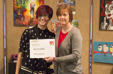 Piedmont's Marisa Brown posing with Jacquelyn Knapp, associate professor of art.