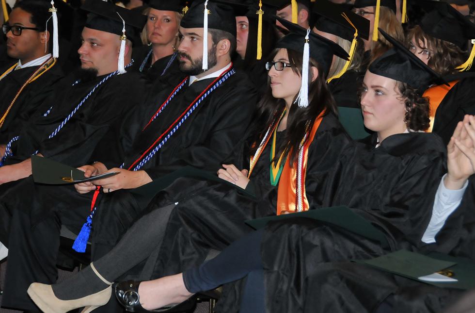 Graduates listen to President John Feaver’s address as part of the Fall commencement at the University of Science and Arts of Oklahoma. The institution, Oklahoma’s only public liberal arts university, presented the 72 graduates with baccalaureate degrees.