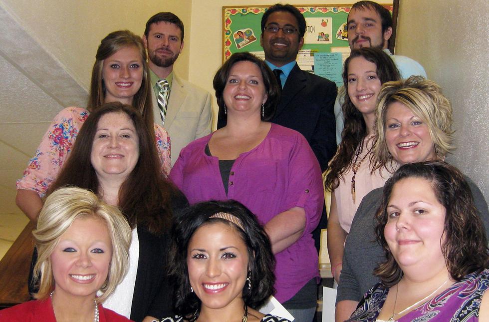 The recent Kappa Delta Pi initiates take a moment to celebrate their achievement.