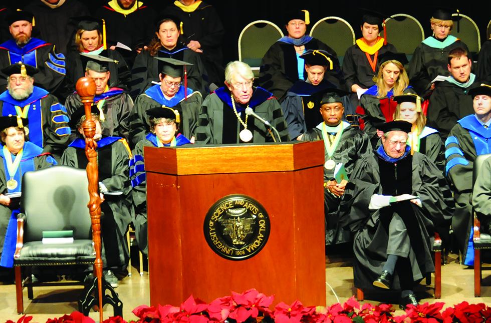 USAO President John Feaver stands before graduates, families, faculty and staff at a recent commencement ceremony in Te Ata Memorial Auditorium. USAO, Oklahoma’s only public liberal arts college, was recently rated as the most affordable institution natio