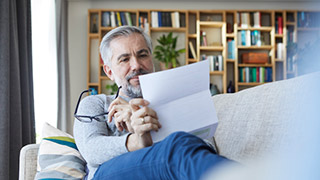 man reading a document