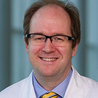 Malcolm MacConmara, M.D.