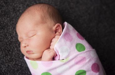 hands to heart sleep swaddle