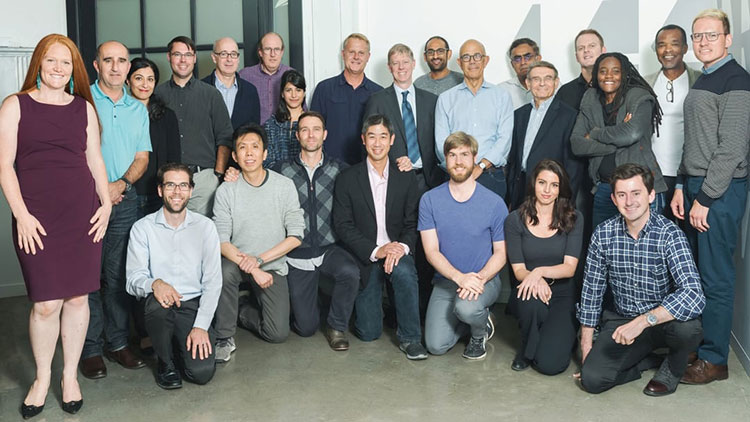 Proprio employees, led by CEO Gabriel Jones, pose for a team photo. (Proprio photo)