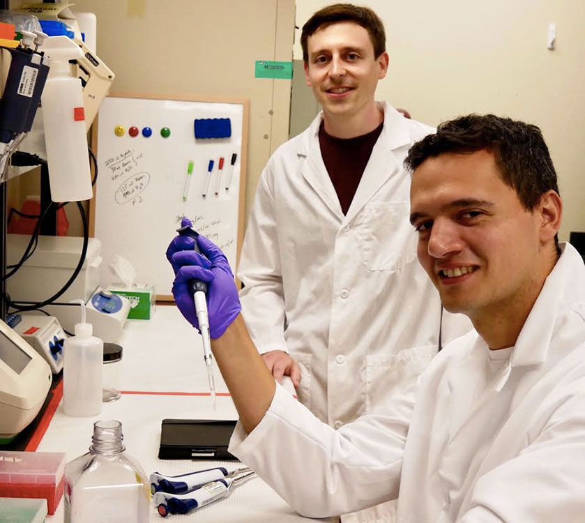 A-Alpha Bio was founded by University of Washington PhD graduates David Younger (standing) and Randolph Lopez. (A-Alpha Bio Photo).