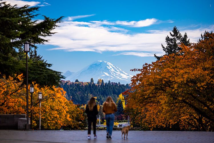 People stand on Rainier Vista