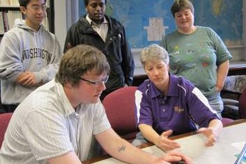 photo of Students work closely with their South King County Food Coalition community project partners during the workshop
