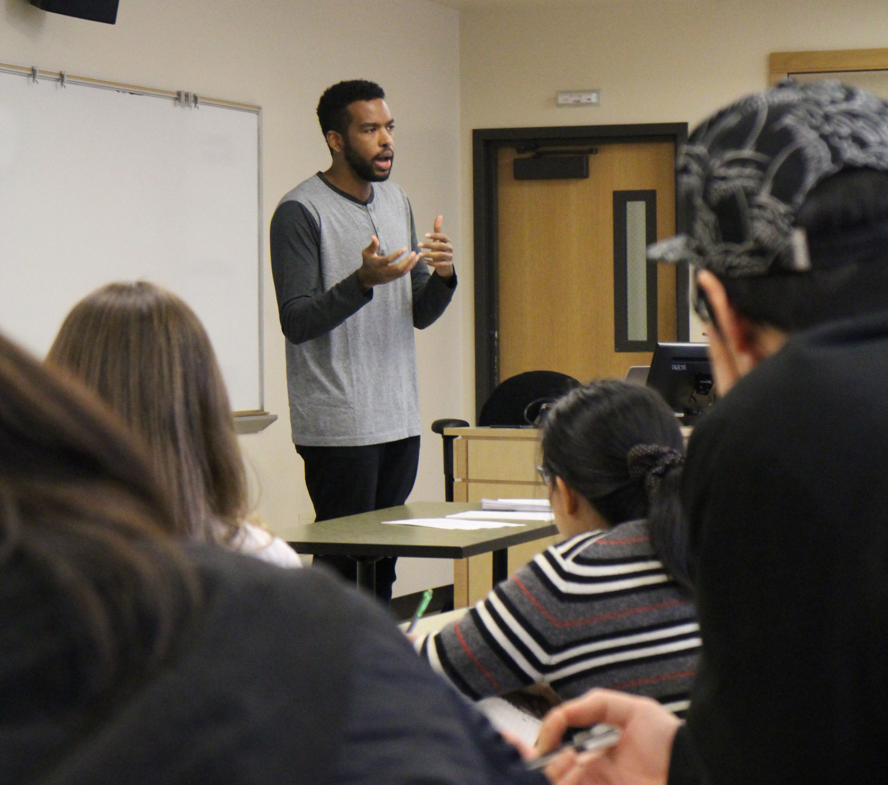 Issa Abdulcadir, pre-doctoral instructor in sociology, teaching a group of undergraduate students