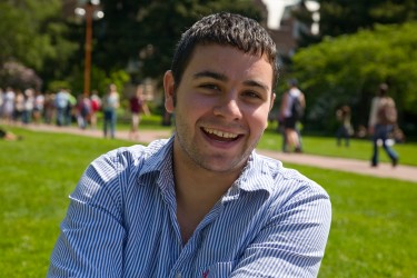 Smiling student in the Quad.