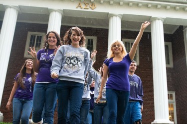 Sorority sisters celebrating a Husky football win.