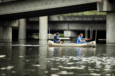 Students canoeing on Union Bay, Waterfront Park, Montlake, near University of Washington.