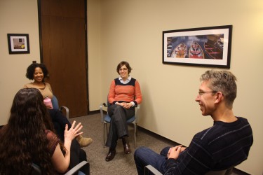 People in a circle talking at the Counseling Center.