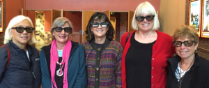 Members of our Afternoon at the Movies group are showing off the 3-D glasses they wore to see the sci-fi blockbuster The Martian.