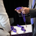 Husky 100 Medal Being Awarded