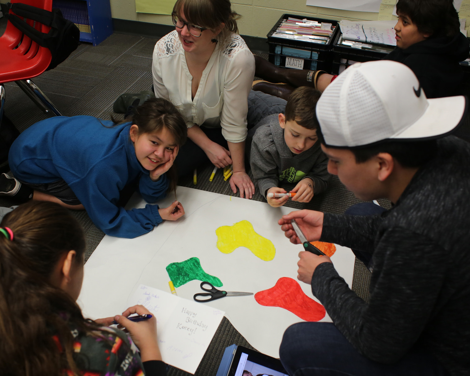 Image of school children working on a project