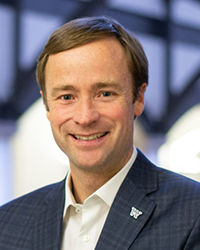 Portrait of Jevin West, Director of the Center for an Informed Public and Associate Professor, UW Information School