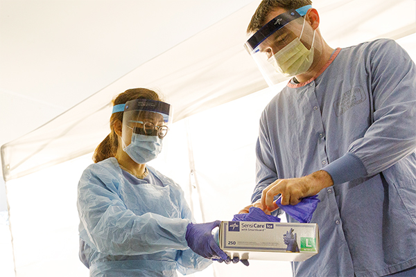 Nurses at a COVID-19 testing location