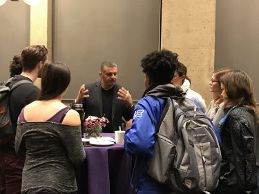 2018 Fellow, Yussef El Guindi,meets with students after his lecture.