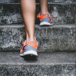 A banner showing a broom, feet going up stairs, and a jump rope and hand weights
