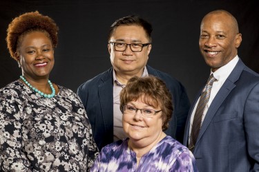 Award for Excellence Recipients: James Dorsey (executive director), Phyllis Harvey-Buschel (curriculum director/government relations), Lucy Casale (senior associate director) and Ku’ulani Seto (executive assistant)