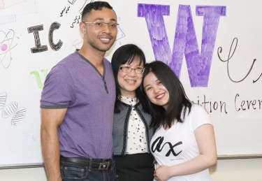 IC Director Therese Mar (center) with economics tutors Max McDonald and Jiayi Zhuo.