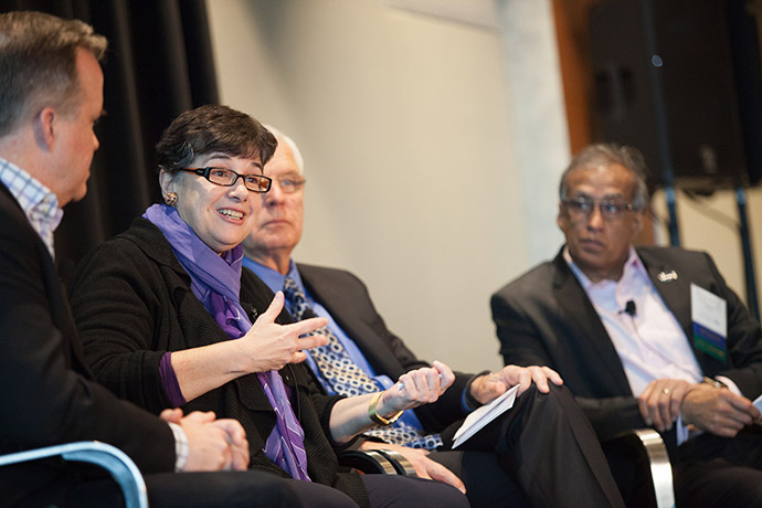 Photo of panelists speaking at the Global Washington conference. Left to right: John Kelly, Starbucks Senior Vice President of Global Public Affairs and Social Impact; UW President Ana Mari Cauce; Richard Stearns, president of World Vision U.S. and Akhtar Badshah, president of the board for Global Washington.