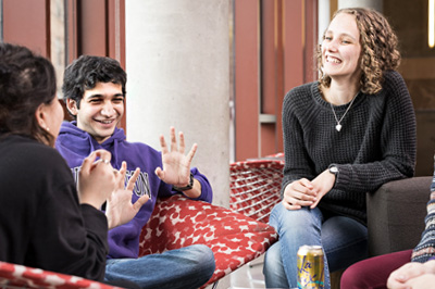 three UW students sitting and chatting