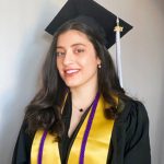 Photo of Maha in graduation attire