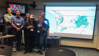 UW & national weather service staff pose for a group photo on Sept. 28, 2019