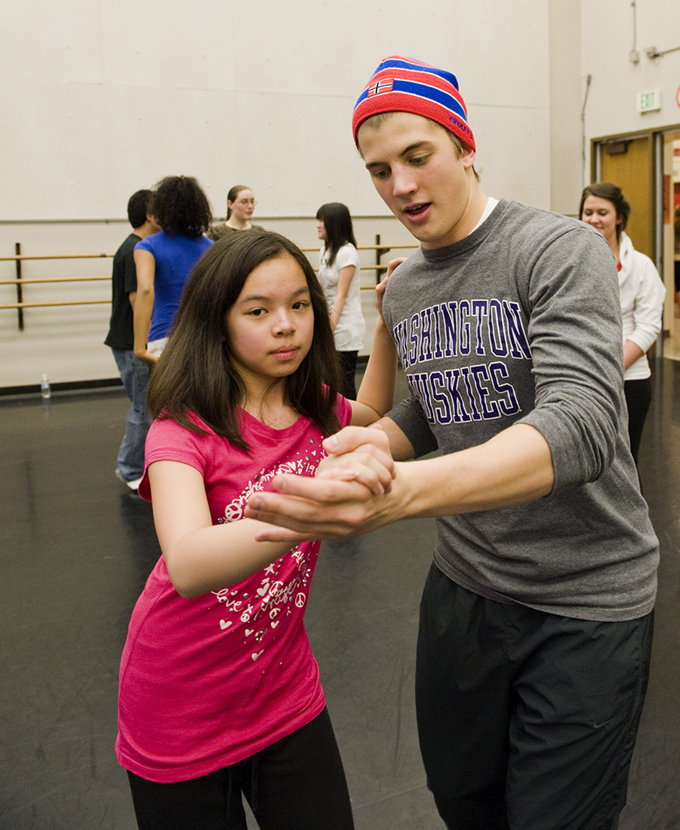 UW student Christopher Dingle dances with Amazing Grace student Felecity Estrella. | Photo by Kathy Sauber