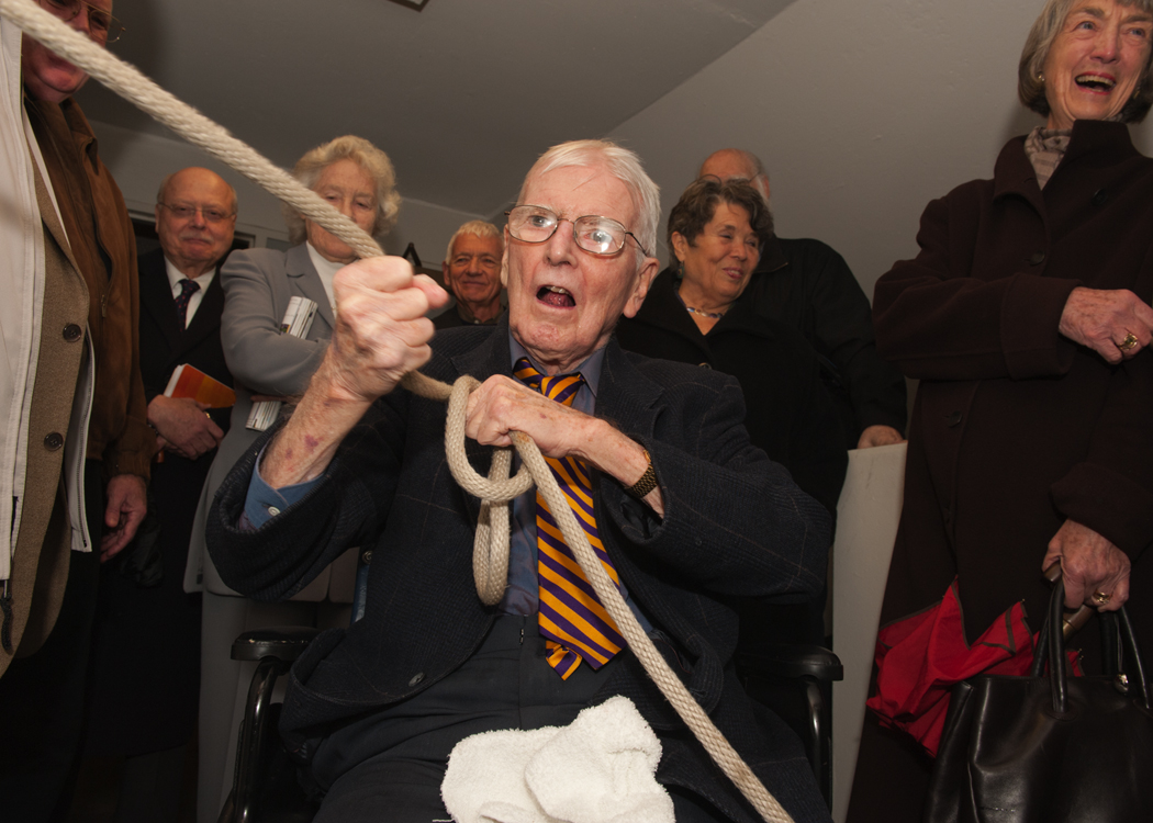 Brewster Denny, dean emeritus of the Evans School of Public Affairs, completes his plan of ringing the Denny Bell to announce Homecoming for a half century.