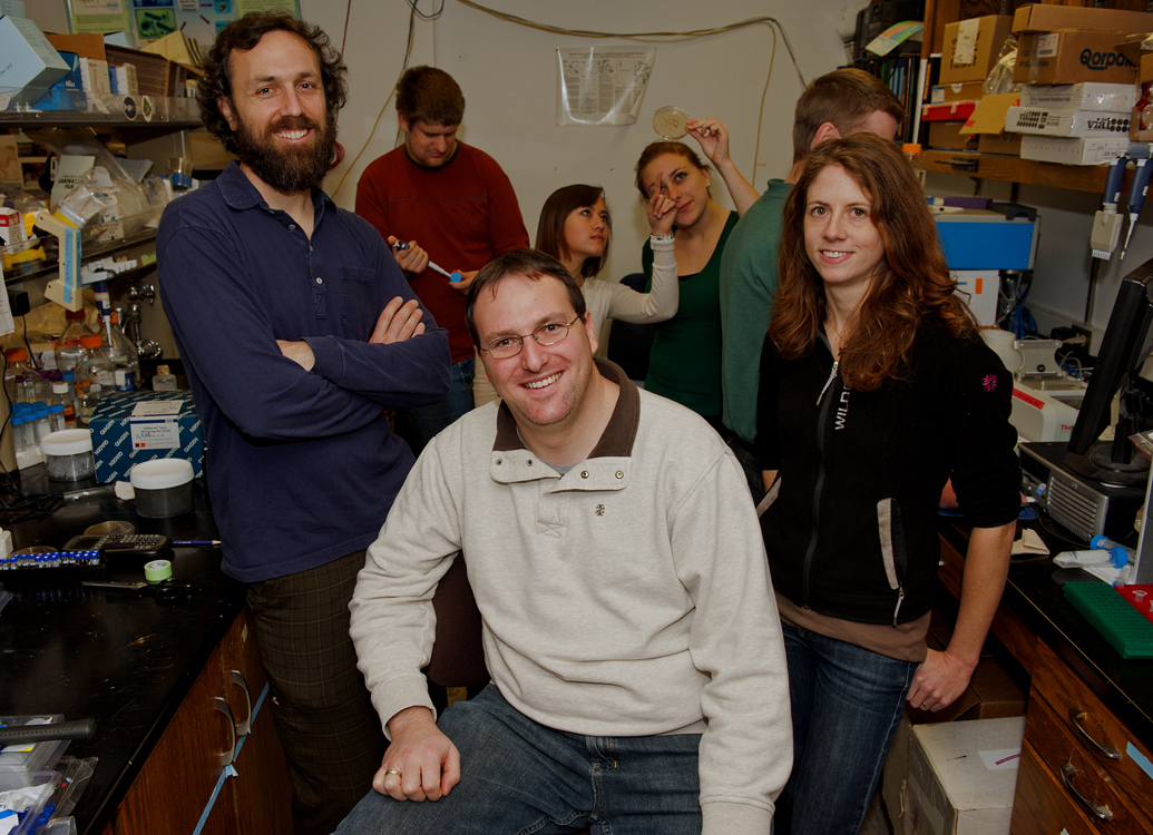 In foreground, from left, are advisers Rob Egbert, Justin Siegel and Ingrid Swanson Pultz, who mentored the iGEM team. In the back are team members Mathew Harger, Sydney Gordon and Liz Stanley.