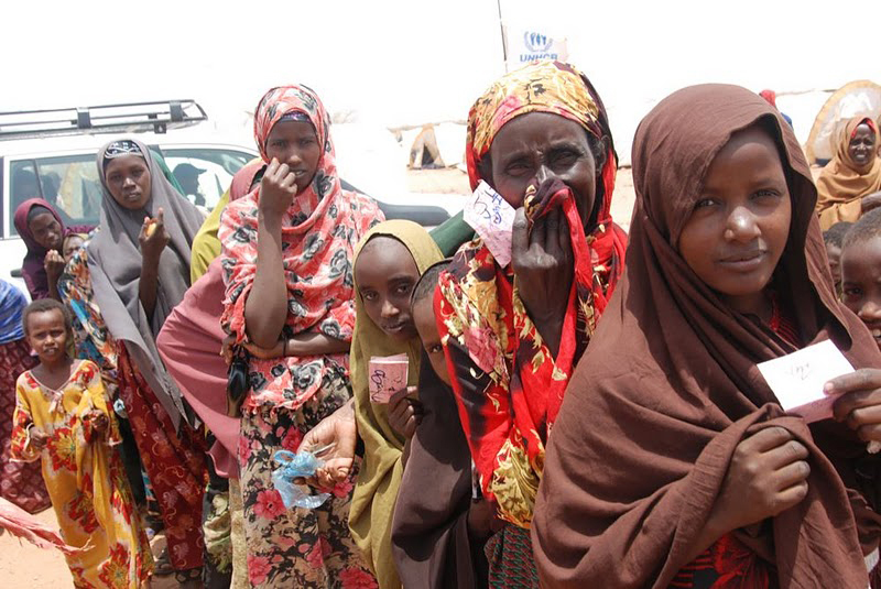 Somali refugees hold meal cards outside a feeding center at an Ethiopian transit camp in September 2011. Severe drought in the Horn of Africa created serious food security issues for many people.