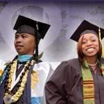 Minority students in caps and gowns.