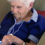A 94-year-old woman reads.