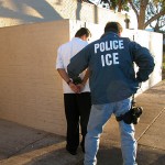 An Immigration and Customs Enforcement arrests a suspect.