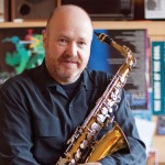 Michael Brockman with a saxophone.