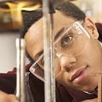 Student using bunsen burner