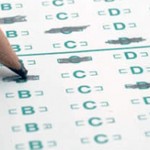 A pencil marking a standardized test.