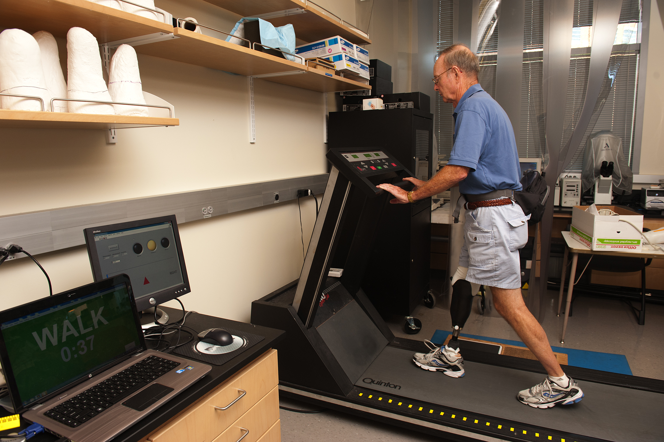 Ron Bailey walks on the treadmill during the testing regimen.