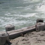 A bulkhead guards a shoreline.