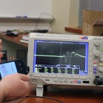 AllSee detects the unique signal changes (shown on the oscilloscope) and classifies a rich set of hand gestures.