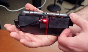 The AllSee prototype is integrated with an off-the-shelf mobile phone. This technology enables new applications such as gesture recognition with the phone still in your pocket.