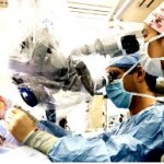 Two in surgical masks look into instruments