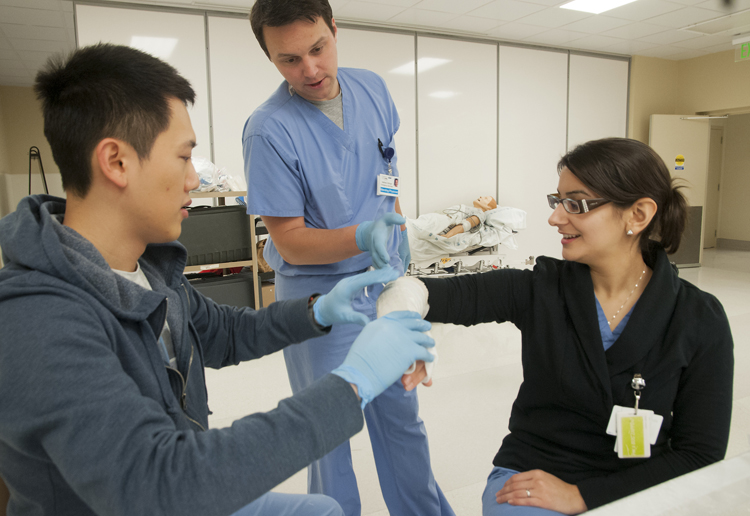 University of Washington medical students practice placing casts.