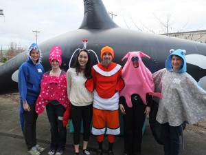 people in fish costumes