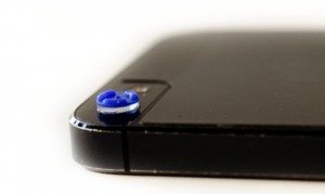 Photo of the micro phone lens on a smartphone.