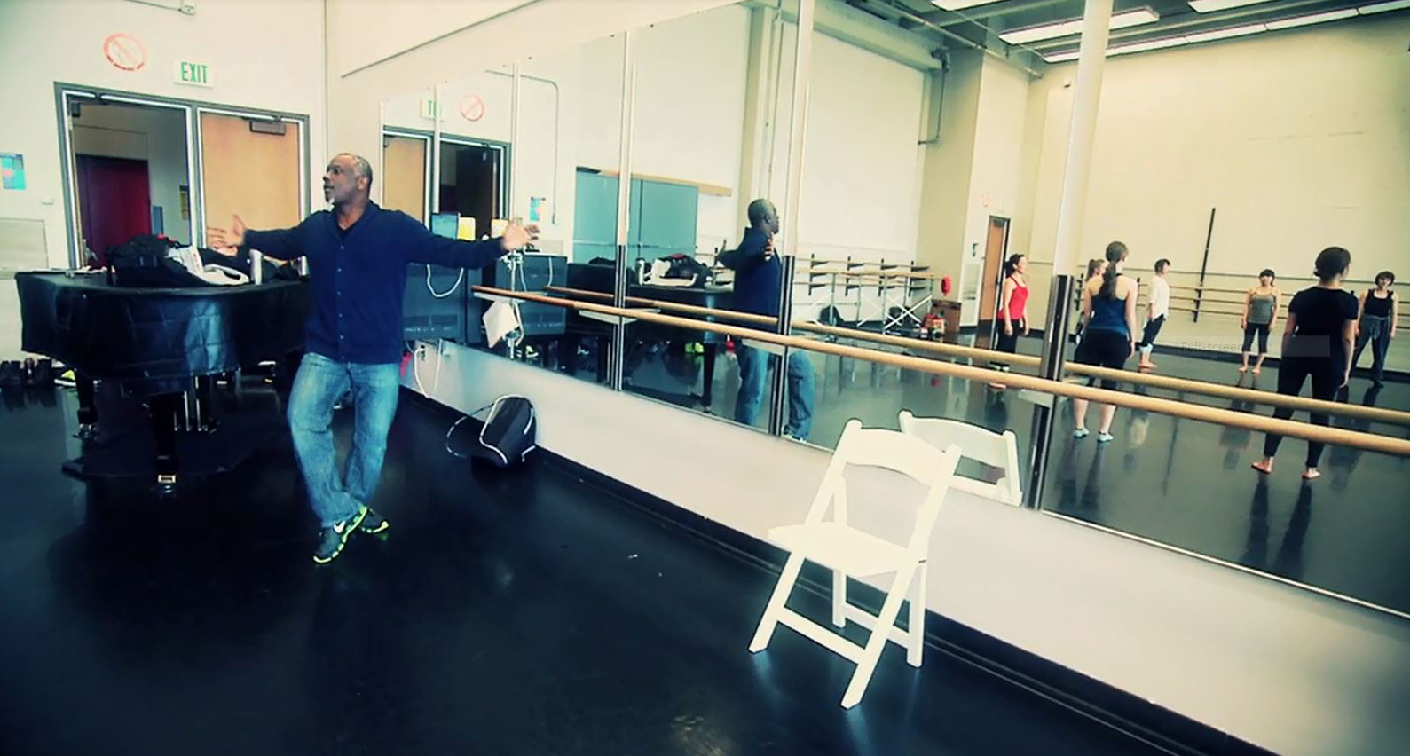 Choreographer Robert Moses works with dancers in a recent rehearsal at the University of Washington.
