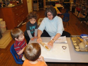 Anita McHarg makes cookies with toddlers.