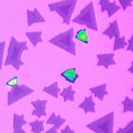 As seen under an optical microscope, the heterostructures have a triangular shape. The two different monolayer semiconductors can be recognized through their different colors.